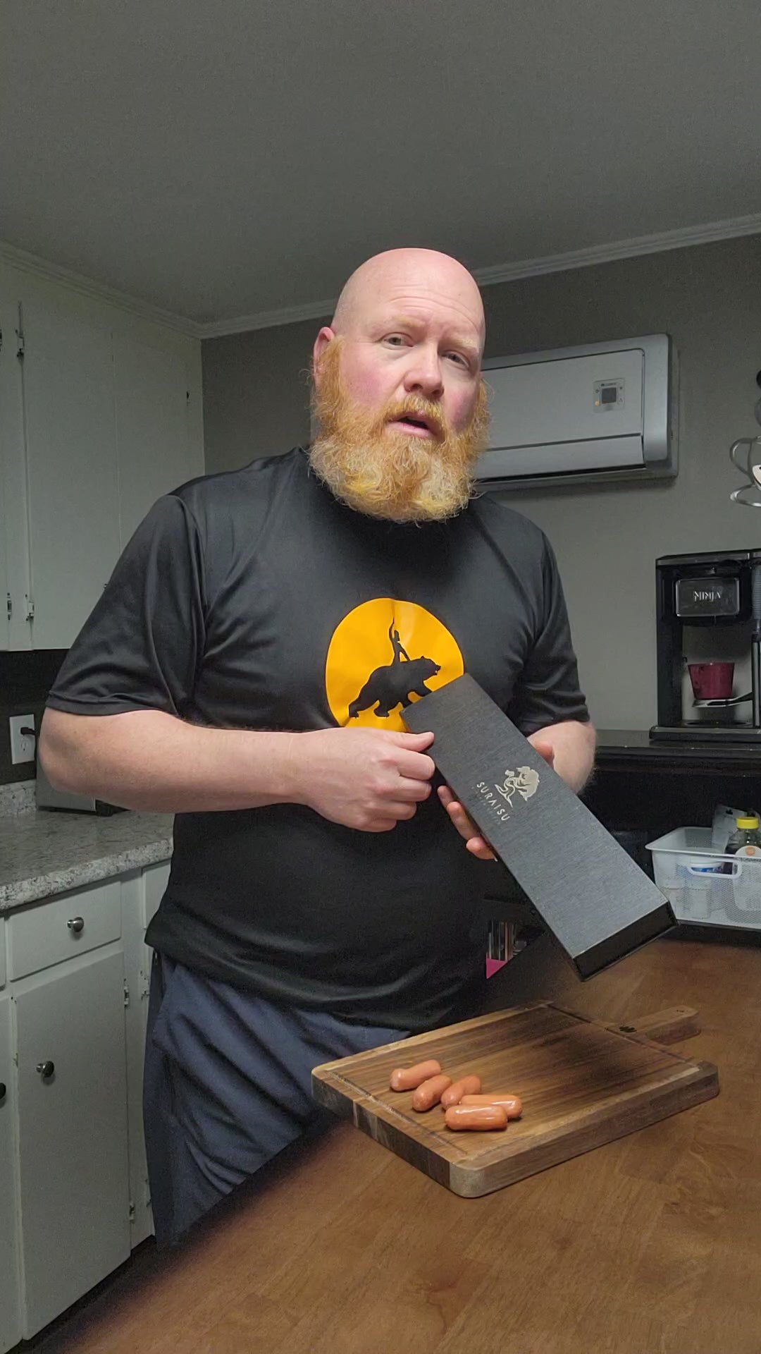 Load video: Video showcasing the features of a Suraisu knife while it is being unboxed from it's packaging.